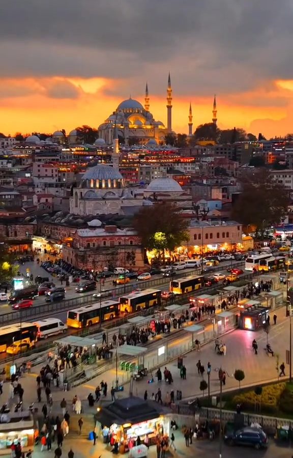 Istanbul drone footage showing a mosque, skyline, traffic and sunset over the city