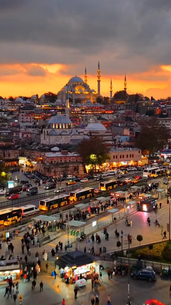 Istanbul drone footage showing a mosque, skyline, traffic and sunset over the city